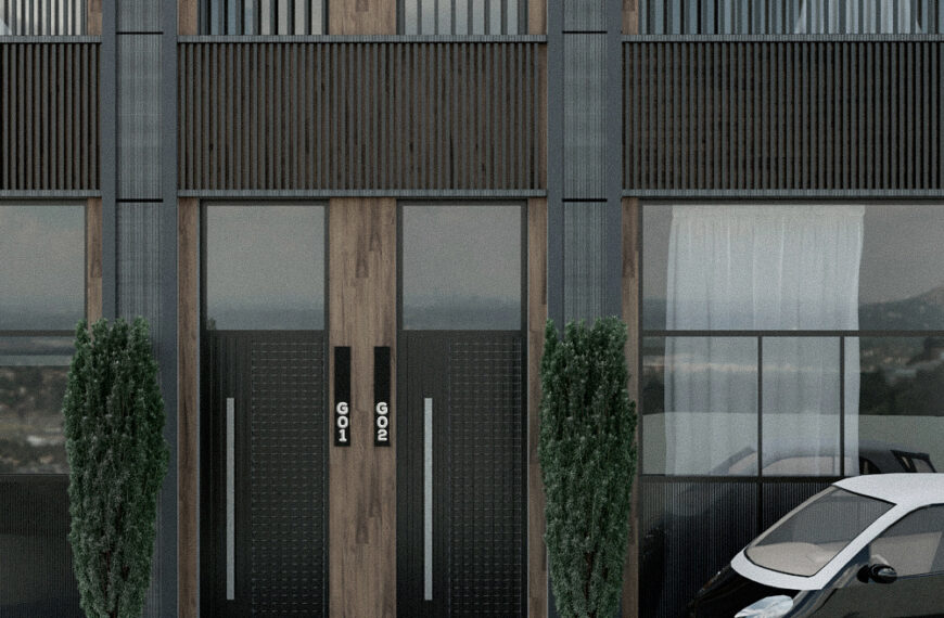 Modulo centrale della facciata con telaio metallico sporgente, balcone in metallo nero opaco, verde integrato e geometria definita. Central façade module with projecting metal frame, black matte metal balcony, integrated greenery and defined geometry.