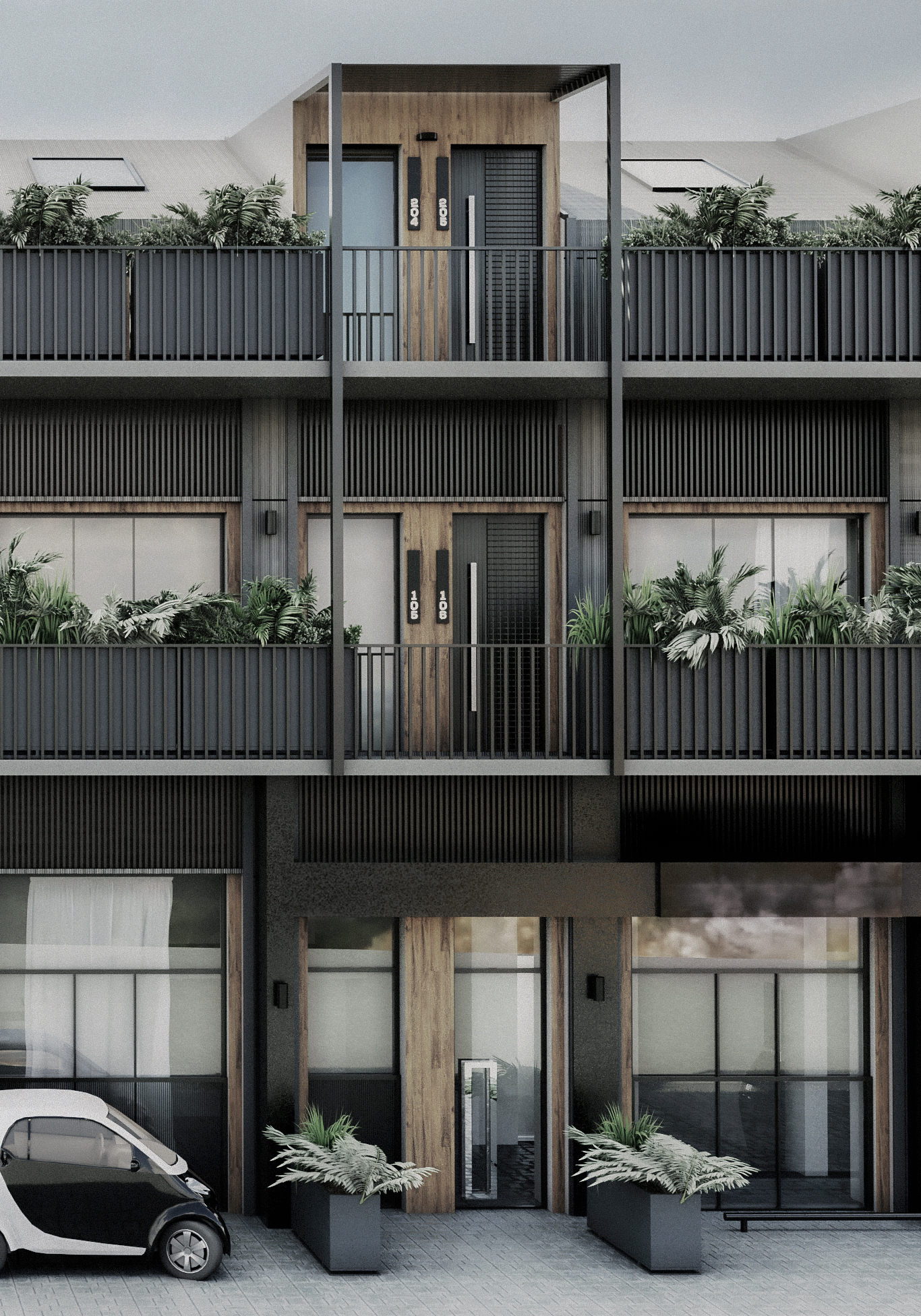 Modulo centrale della facciata con telaio metallico sporgente, balcone in metallo nero opaco, verde integrato e geometria definita. Central façade module with projecting metal frame, black matte metal balcony, integrated greenery and defined geometry.
